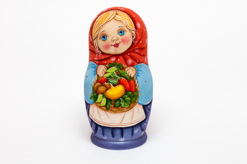 Русский сувенир - Матрёшка, раскраRussian souvenir - doll Matryoshka, hand-painted. Picture taken on a white background with studio lighting, no shadows.шенная вручную