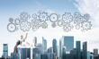 © adam121 - Business lady float on cloud touching drawn gear mechanism