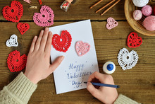 Making Of Handmade Valentine Greeting Card With Crochet Openwork Hearts. Making Of Handmade Decoration. Valentines Day Crafts. Childrens DIY, Hobby Concept, Gift With Your Own Hands.