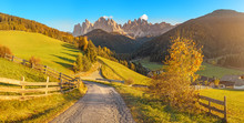 Funes Valley landscape during autumn in Santa Magdalena village with Odle mountain range on the background. Travel in Italian Dolomites concept