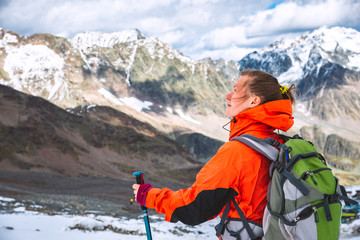 Wall Mural - young woman hiking in the mountains