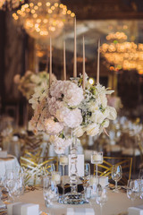 wedding decorations with flowers and candles. banquet decor. picture with soft focus