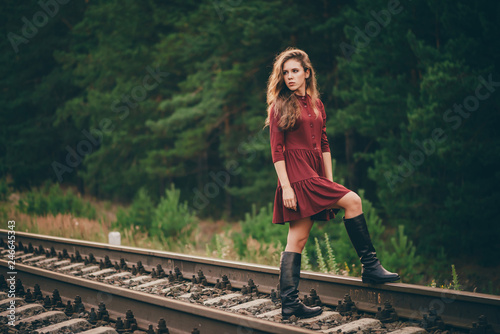 Beautiful Sad Thoughtful Girl With Curly Natural Hair On Nature In