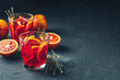Red orange juice in a large glass or aperitif with campari
