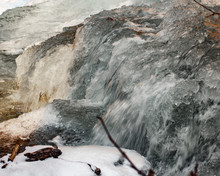Frozen Waterfall In Winter Forest