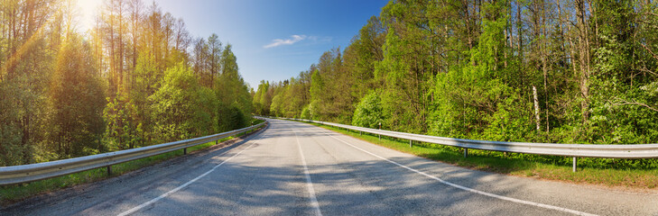 Wall Mural - Road panorama on sunny spring day