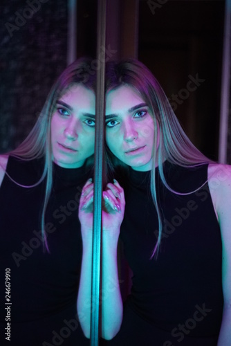 Cuadros en Lienzo Self reflection portrait of amazing young girl in mirrored window