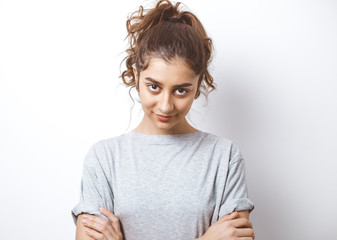 Wall Mural - Portrait of a cute Indian girl. Smiling young woman on white background.