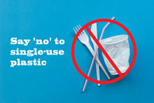 White Single-use Plastic And Plastic Drink Straws On A Blue Background. Say No To Single Use Plastic. Environmental, Pollution Concept.