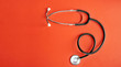 © Deno - Stethoscope on red background