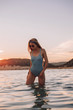 © pha88 - Girl with a gorgeous figure on the sea during sunset.Sexy girl on a wild beach.The girl in the water