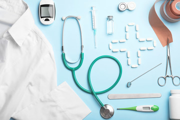 Wall Mural - Flat lay composition with medical objects on color background