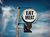 Fototapeta Młodzieżowe - aged and worn eat meat sign