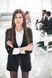 © ASDF - Executive business woman on the background of the workplace