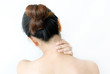 © Photo Sesaon - Women have neck pain, shoulder pain, at the park health concept.
