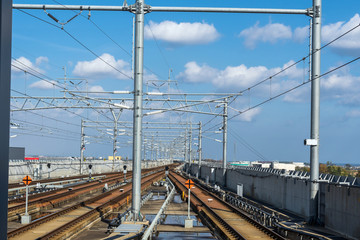 Railroad tracks or subway inn blue sky day, transportation concept