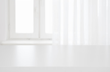 Wall Mural - white table top on blurred pastel background of curtained window