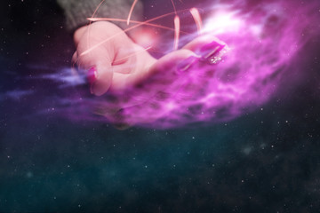 Aufkleber - Human hand holding atom on a palm. Nebula dust in infinite space. Mixed media.