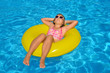 © SuperCoolPhotography - Real adorable girl relaxing in swimming pool