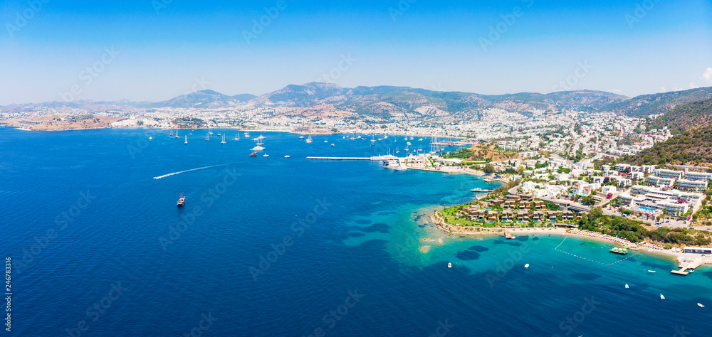 Panoramic aerial view of sunny Bodrum with resorts and beachfront villas - obrazy, fototapety, plakaty 