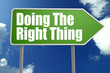 © tang90246 - Doing The Right Thing word with green road sign