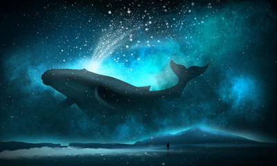 The depths of the sun through the water, the underwater world, the sea floor. Sea fantasy, big whale, sperm whale, the silhouette of a man by the sea. Night view.