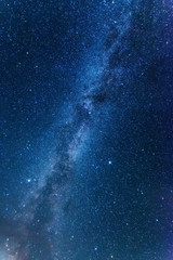 bright night starry sky with millions of stars and galaxy milky way.