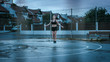 Beautiful Energetic Fitness Girl in Black Athletic Top and Shorts is Skipping/Jumping Rope. She is Doing a Workout in a Fenced Outdoor Basketball Court. View from Behind the Fence. Evening After Rain.