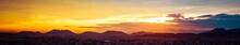 A Panorama Of A Colorful Sunset Over The Desert Of The American Southwest In Arizona.
