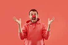 The Happy Surprised And Smiling Man On Red Nose Day. The Clown, Fun, Party, Celebration, Funny, Joy, Holiday, Humor Concept