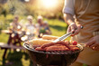 © ivanko80 - Young man grilling meat on barbecue