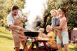 © ivanko80 - Family having a barbecue in the garden