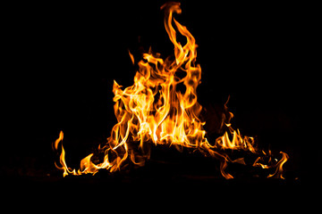 Fire flames burning isolated on black background. High resolution wood fire flames collection smoke texture background concept image.