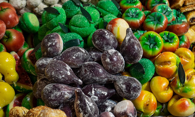 colorful Sicilian marzipan sweets in the shape of fruits