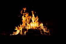 Fire Flames Burning Isolated On Black Background. High Resolution Wood Fire Flames Collection Smoke Texture Background Concept Image.