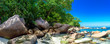 Panoramic view of Seychelles beach with stones