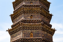 The Iron Pagoda Of Kaifeng, Henan, China. Built In 1069 And 57m High, Its Glazed Surface Of Iron Color Features 1600 Intricate And Richly Detailed Carvings. Kaifeng Is An Ancient Capital Of China