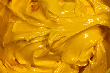 close up yellow color of oil paint. ink of screen printing  for print on tee shirts and fabric