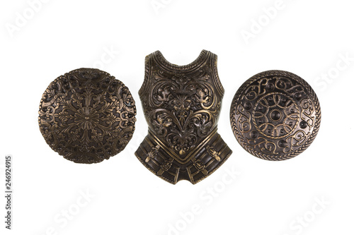 Fotografía knight armor and shield on white isolated background