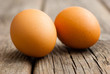 © tstock - two eggs on weathered wooden table