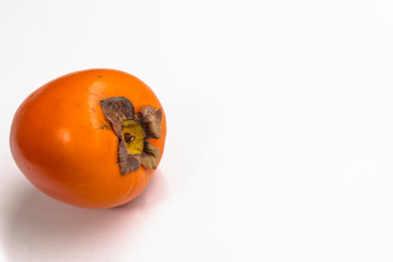 Fresh ripe persimmons isolated on white background. Fresh Persimmon fruit