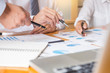 © snowing12 - Business team data analyzing income charts document during discussion explain strategy meeting. on start-up project teamwork together.