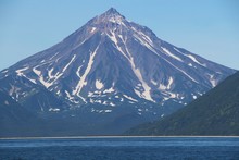 View Of Vilyuchinsky Volcano (also Called Vilyuchik) From Tourist Boat. It's A Stratovolcano In The Southern Part Of Kamchatka Peninsula, Russia.