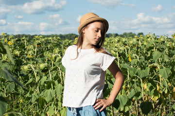 Wall Mural - Young girl relaxes in the sun.