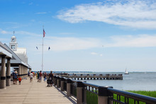 People Walk Along The Pier On A Sunny Summer Day. Joe Riley Waterfront Park. Charleston, SC / USA - July 21 2018