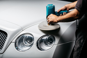 Canvas Print - Car detailing series: Polishing white luxury car