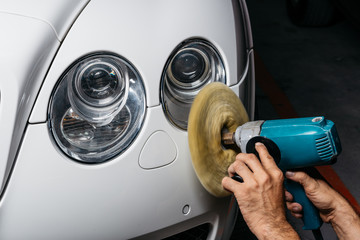 Wall Mural - Car detailing series: Polishing white luxury car