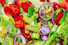 Mix Of Vegetables Chopped Tomatoes Lettuce Red Onion Rings Closeup Background Culinary Colorful Menu Design