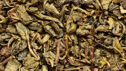 Poster - Green tea is dried up close-up