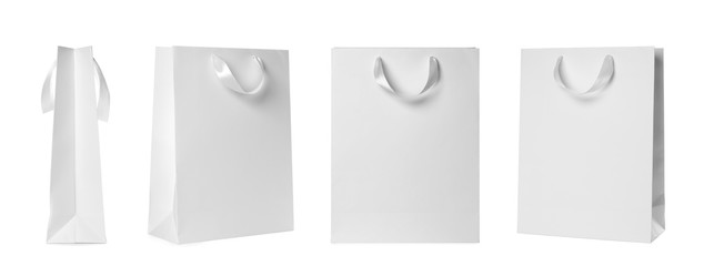 Wall Mural - Set of paper bags for shopping on white background. Mockup for design